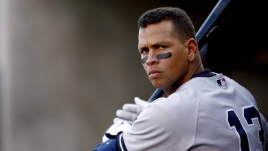 Alex Rodriguez 13 of the New York Yankees warms up in the dugout in a game against the Detroit Tigers during Game Four of the 2006 American League Division Series on October 7, 2006 at Comerica Park in Detroit, Michigan.