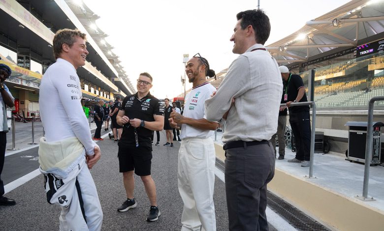 Brad Pitt, engineer Peter Bonnington, driver Lewis Hamilton and director Joseph Kosinski on the set of F1.