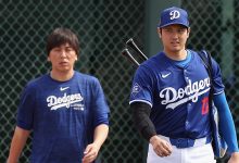 Shohei Ohtani #17 of the Los Angeles Dodgers and interpreter Ippei Mizuhara arrive to a game against the Chicago White Sox at Camelback Ranch on February 27, 2024 in Glendale, Arizona.