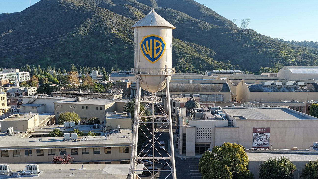 An aerial view of the Warner Bros. logo displayed on the water tower at Warner Bros. Studio on December 5, 2025 in Burbank, California.