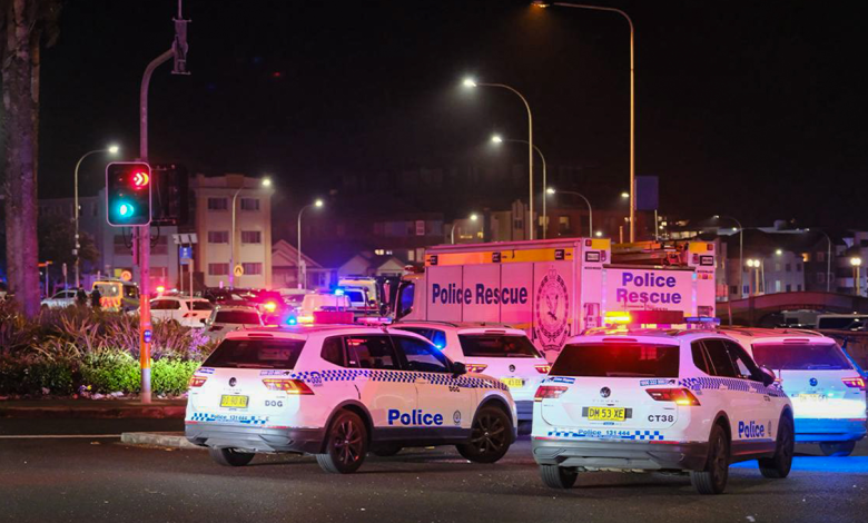 Police cars are seen parked at the scene of a mass shooting at Bondi Beach on Dec. 14, 2025, in Sydney, Australia.