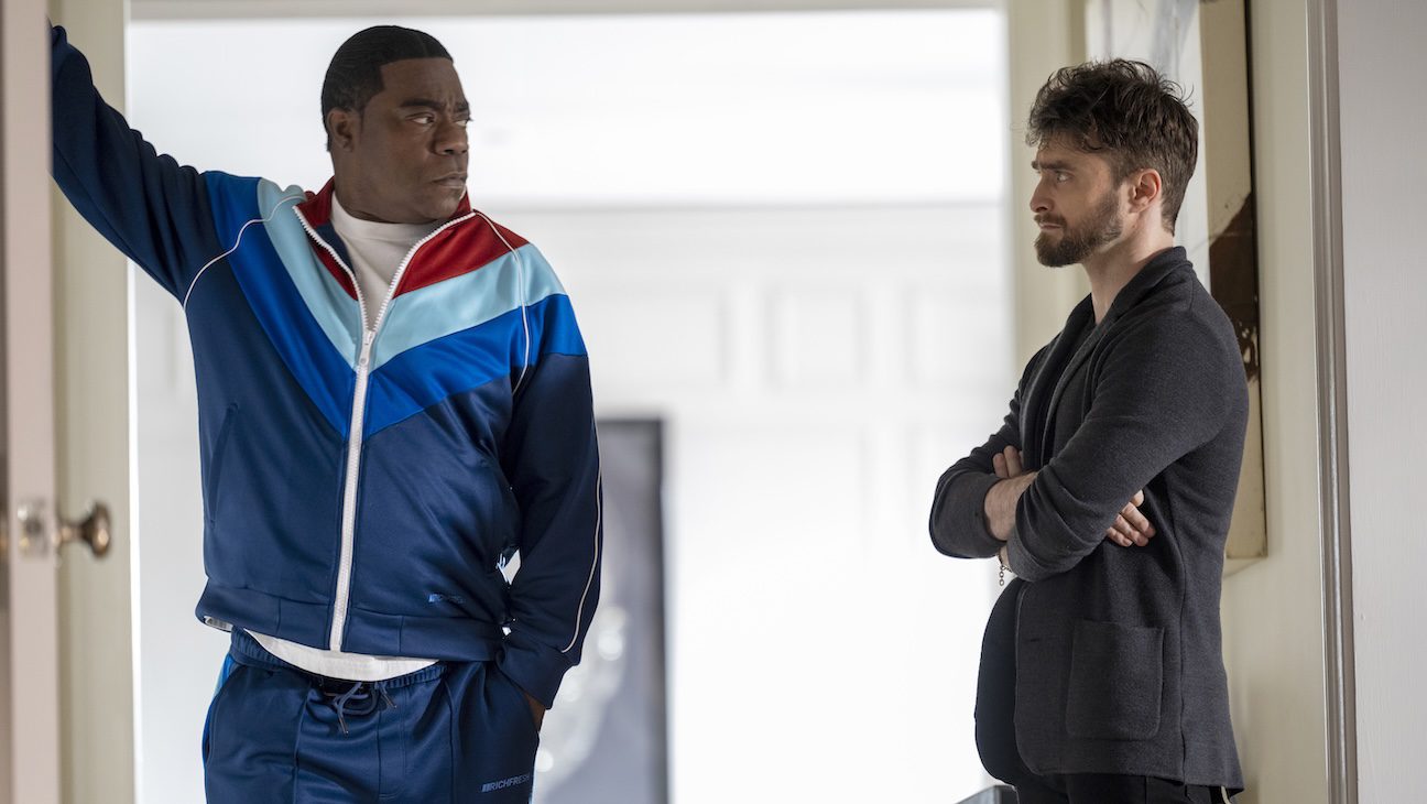 Tracy Morgan as Reggie Dinkins, Daniel Radcliffe as Arthur Tobin in The Fall and Rise of Reggie Dinkins