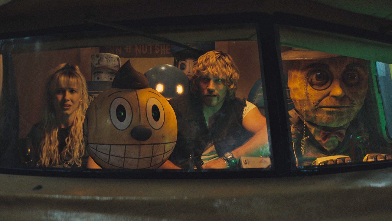 (L to R) Michelle (Millie Bobby Brown), Cosmo (voiced by Alan Tudyk), Herman (Voiced by Anthony Mackie) Keats (Chris Pratt) and Mr. Peanut (voiced by Woody Harrelson) in The Electric State.