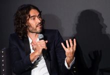 Russell Brand speaking at event