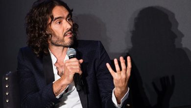 Russell Brand speaking at event