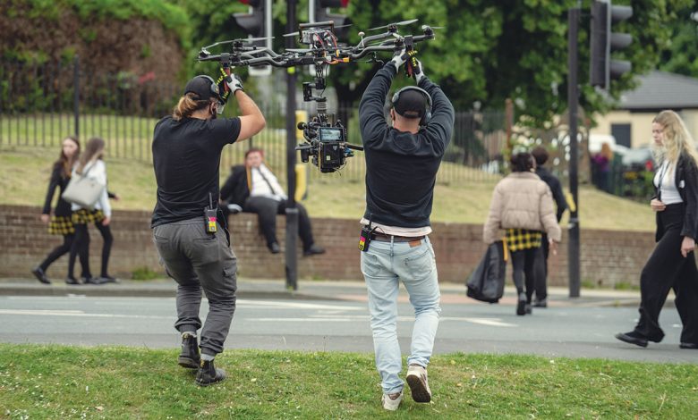 Camera operators hold a rig while shooting episode two of Adolescence