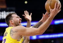Luka Doncic #77 of the Los Angeles Lakers scores on a layup during the first half against the Charlotte Hornets at Crypto.com Arena on January 15, 2026 in Los Angeles, California.