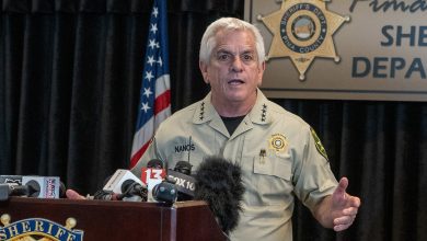 Pima County Sheriff, Chris Nanos (left), speaks to the media on February 3, 2026 in Tucson, Arizona.