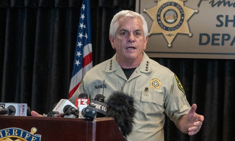 Pima County Sheriff, Chris Nanos (left), speaks to the media on February 3, 2026 in Tucson, Arizona.