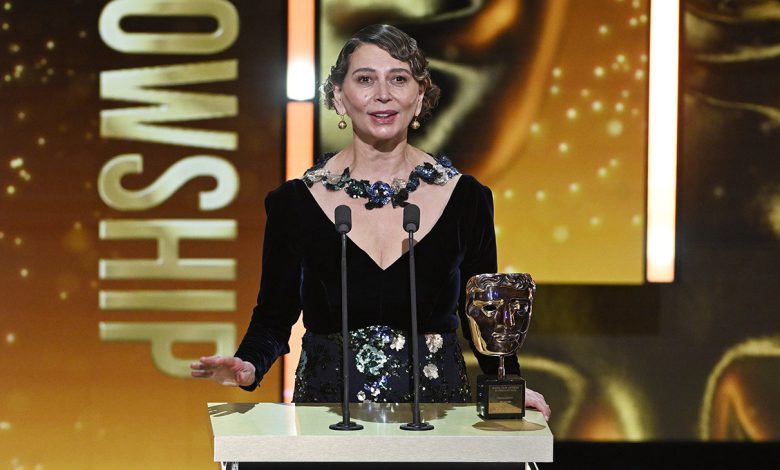 Dame Donna Langley accepts the Fellowship Award on stage during the EE BAFTA Film Awards 2026 at The Royal Festival Hall on February 22, 2026 in London, England.