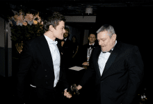 Robert Aramayo and John Davidson backstage during the EE BAFTA Film Awards 2026 at The Royal Festival Hall on Feb. 22, 2026, in London, England.