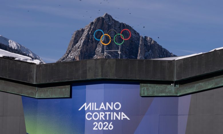 The Olympic Rings are set in front of surrounding mountains at Cortina Curling Olympic Stadium on January 26, 2026 in Cortina d
