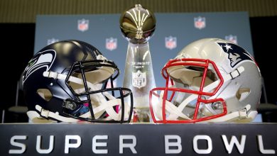 The Vince Lombardi Trophy is framed by the Seattle Seahawks and New England Patriots helmets during Super Bowl LX Opening Night at San Jose McEnery Convention Center on February 2, 2026 in San Jose, California.