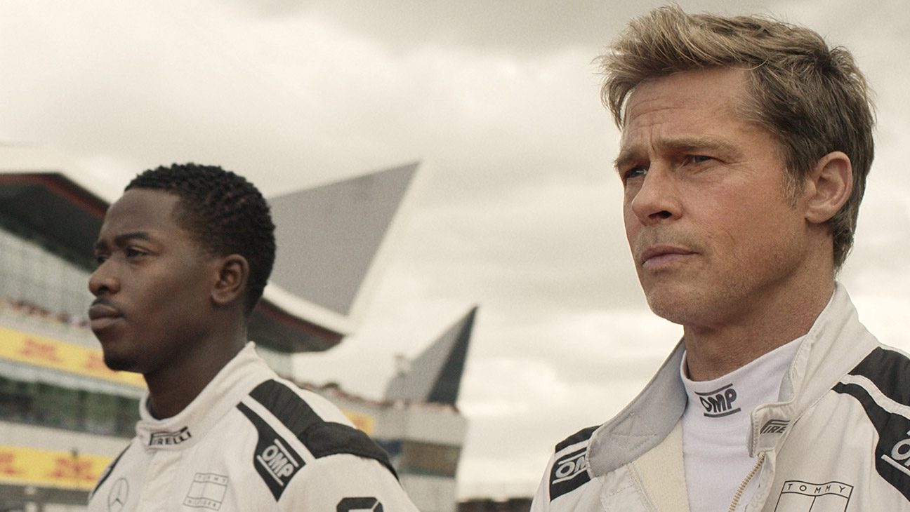 Damson Idris as Joshua Pearce and Brad Pitt as Sonny Hayes in F1