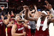 Bam Adebayo #13 of the Miami Heat celebrates with teammates after defeating the Washington Wizards at Kaseya Center on March 10, 2026 in Miami, Florida.